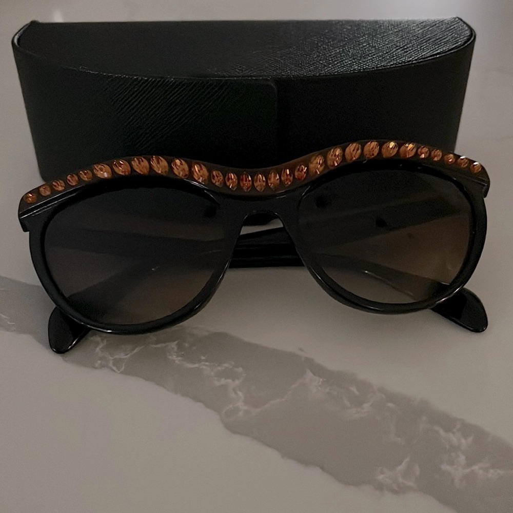 Prada sunglasses.